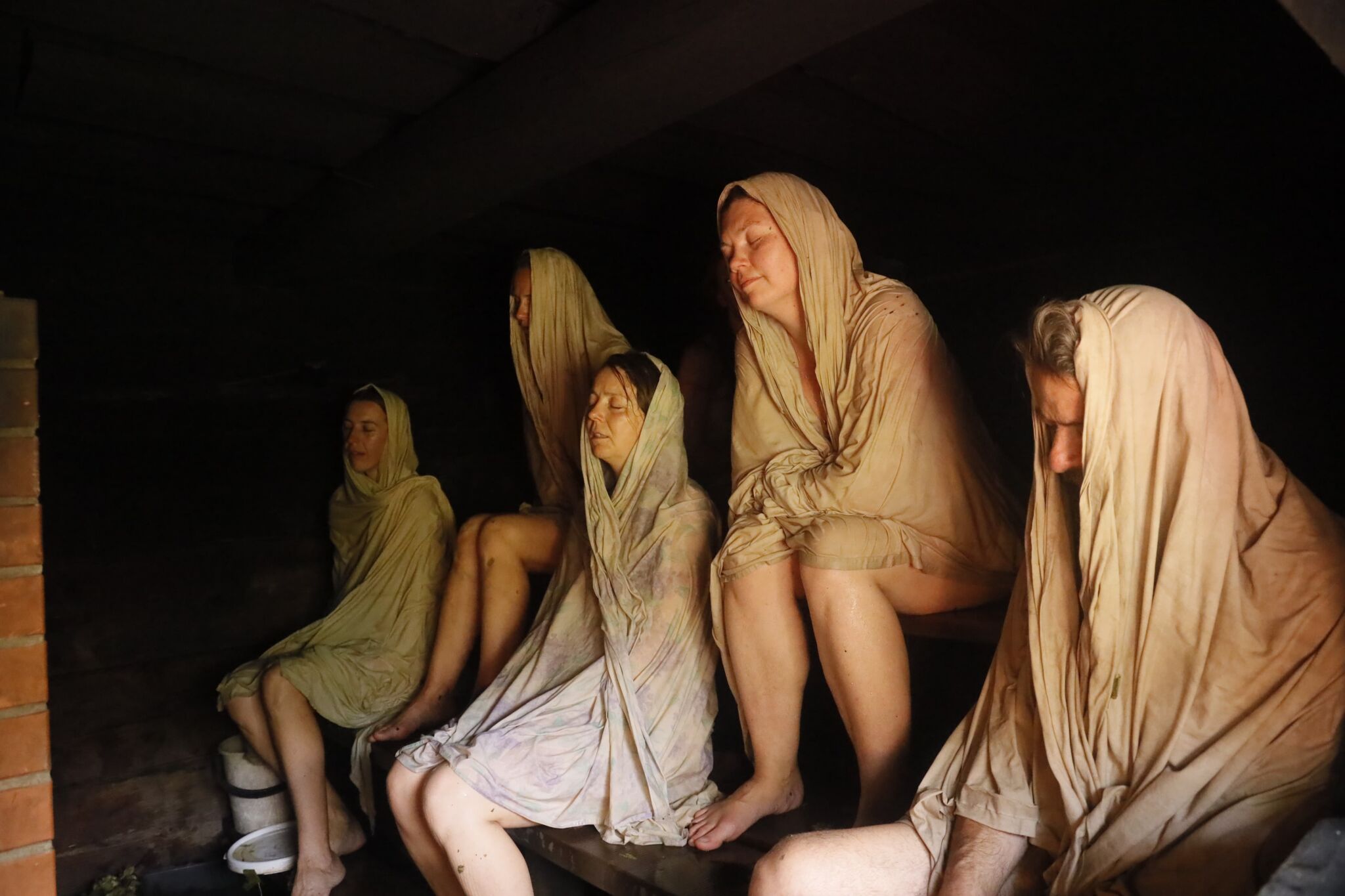 People sitting in sauna